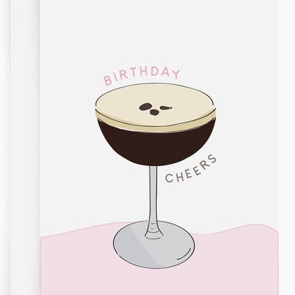 Cocktail glass with birthday design on a white background