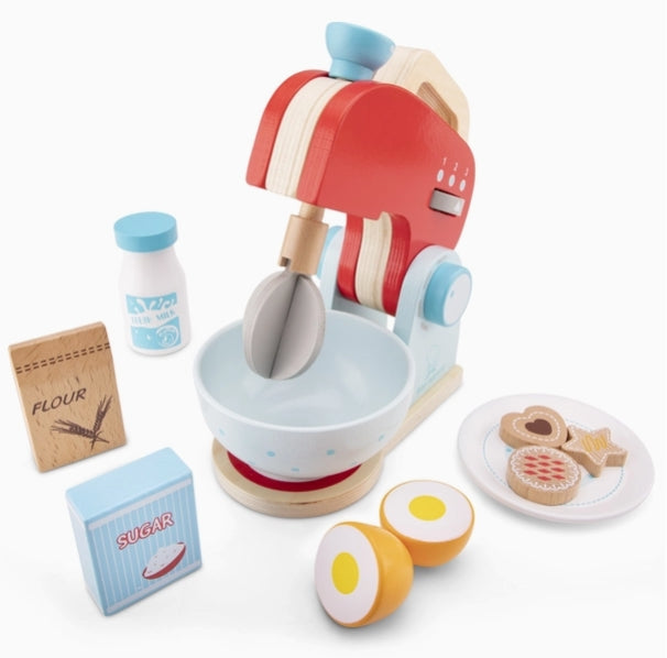 Wooden toy kitchen set with mixer, bowls, and baking items on a white background
