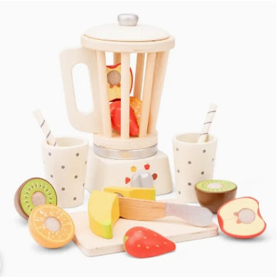 Wooden toy kitchen set with fruits and utensils on a white background