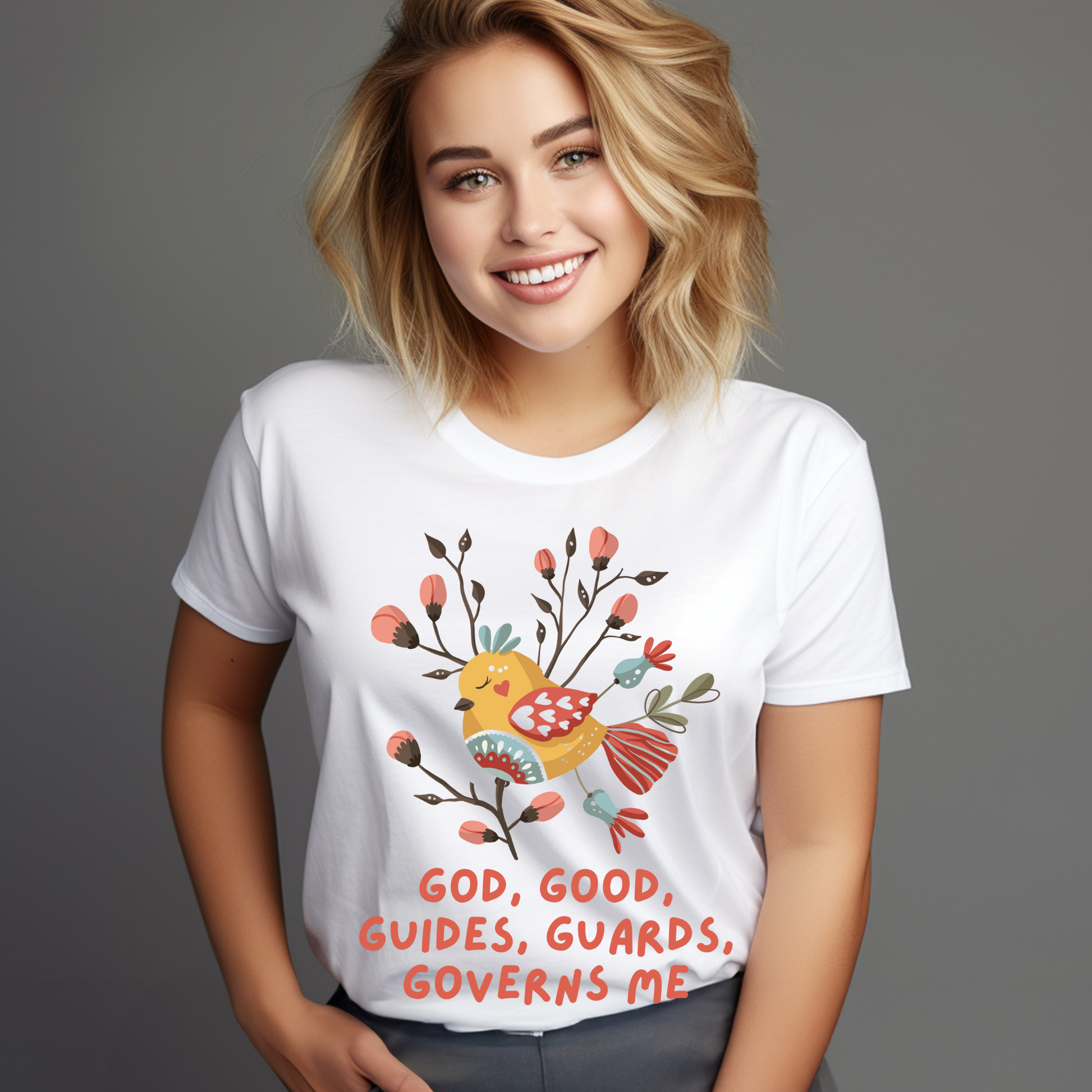White t-shirt with a colorful bird design and text on a wooden surface