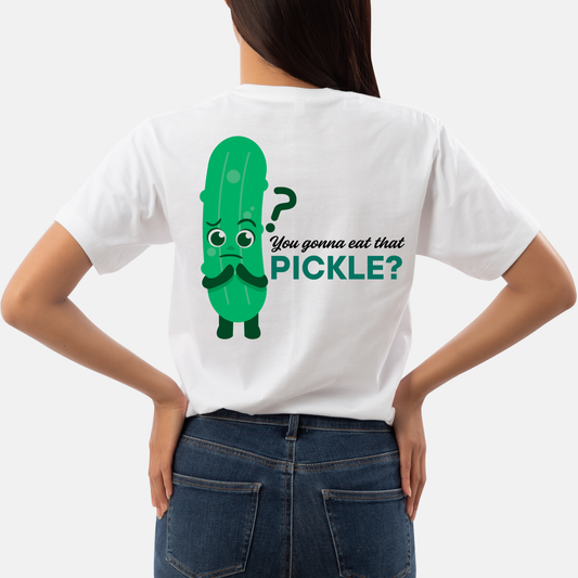 White t-shirt with a pickle graphic and text on the back, worn by a person.