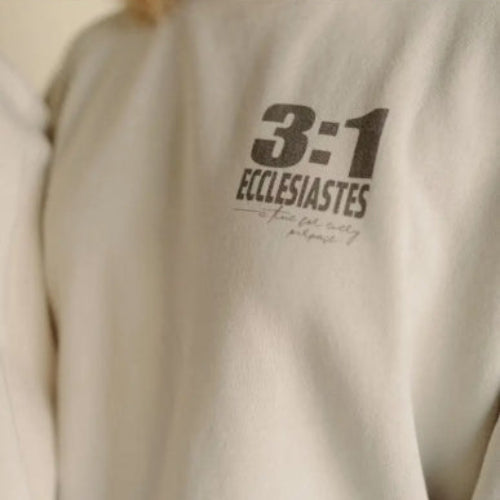 Beige sweatshirt with text on the chest