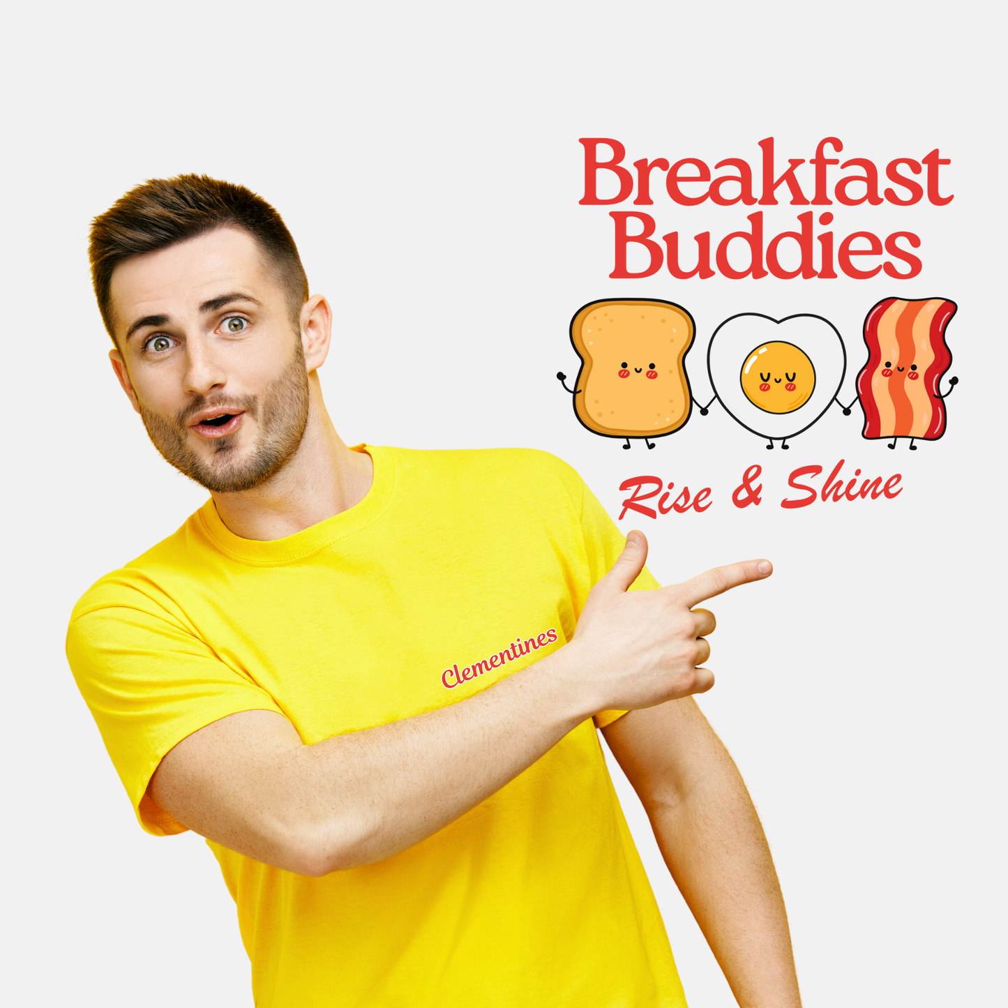 Man in a yellow shirt pointing to a 'Breakfast Buddies' book cover with cartoon food characters.