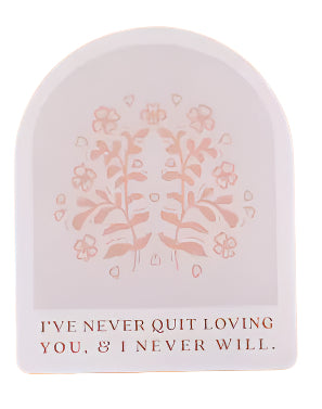 Card with floral design and text on an orange background