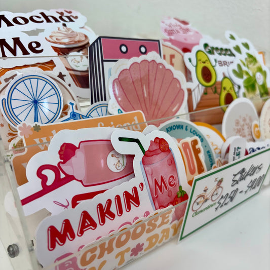 Collection of colorful stickers with various designs on a white background