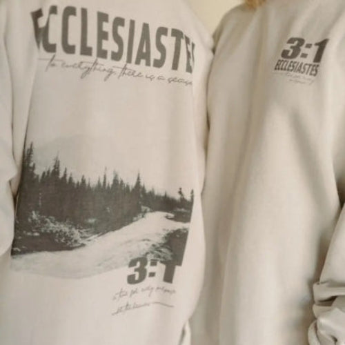 Sweatshirt with nature graphic and text on a beige background