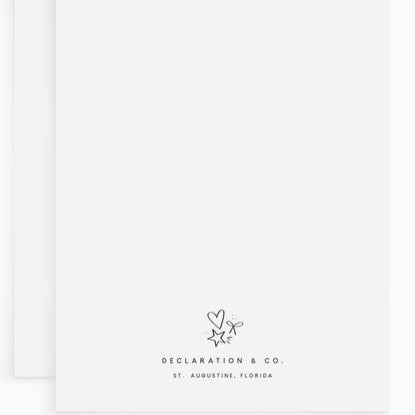 White card with black text and logo, featuring 'Declaration & Co.' branding.