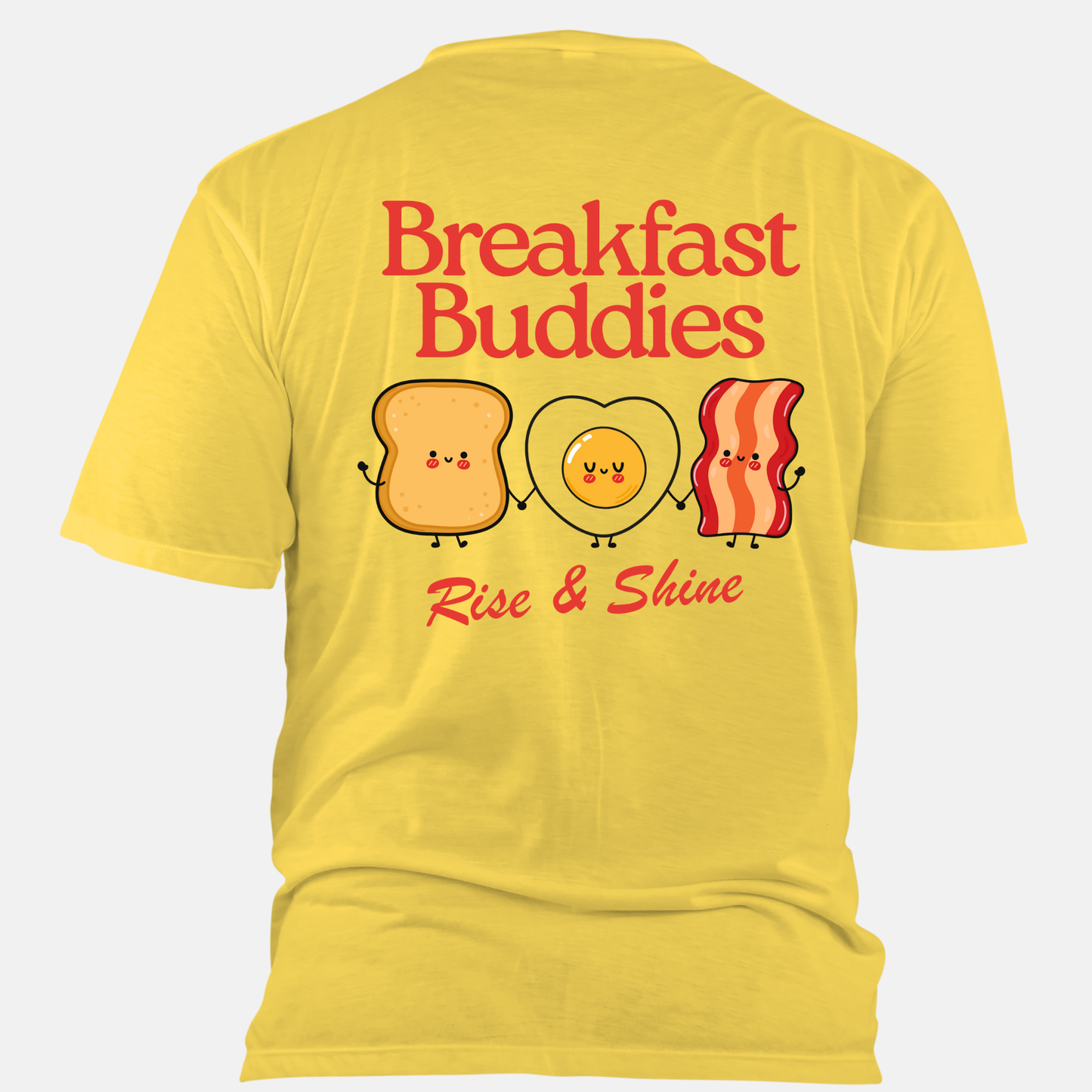 Yellow t-shirt with 'Breakfast Buddies Rise & Shine' design on a white background