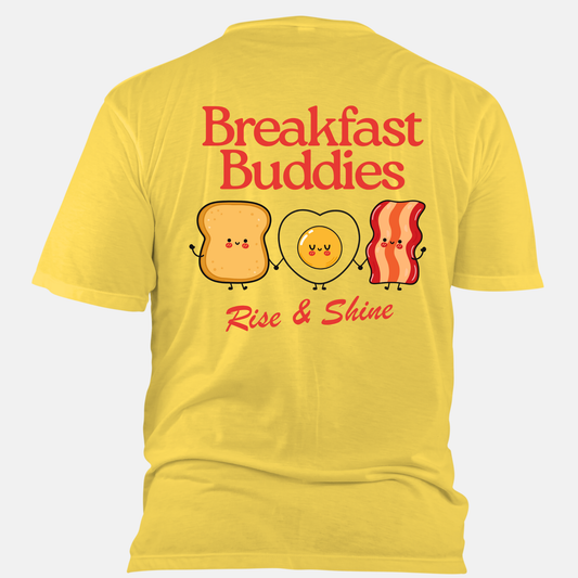Yellow t-shirt with 'Breakfast Buddies Rise & Shine' design on a white background