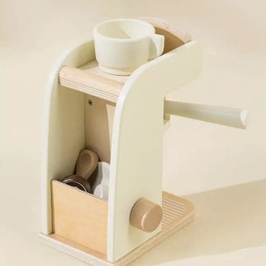 Wooden shelf with a cup and other items on a light beige background