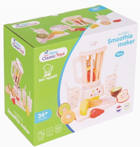 Box of a toy smoothie maker with colorful fruits and a blender on a white background