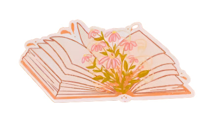Illustration of an open book with flowers on a solid background