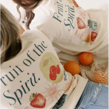 Two pillows with 'Fruit of the Spirit' text and fruit illustrations on a white background.