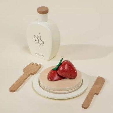 Set of wooden toys including a bottle, fork, and strawberry on a white background